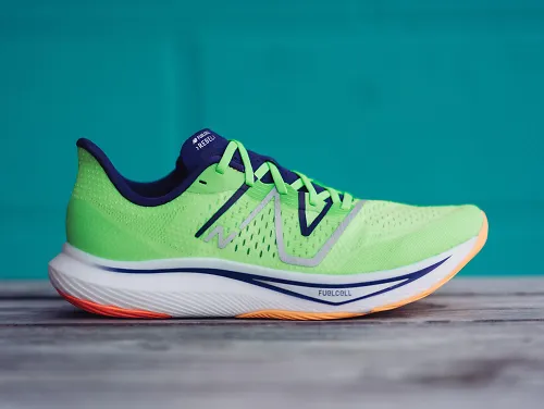 A side profile of the men's New Balance Rebel v3.