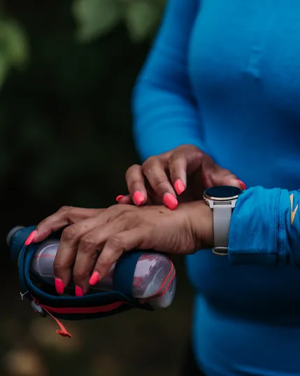 A woman stopping her Garmin watch