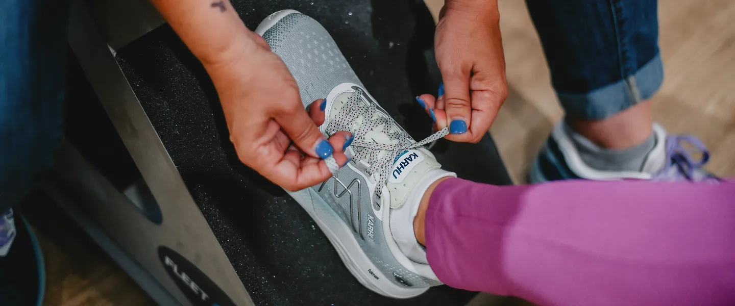 A woman gets fit at Fleet Feet and learns how running shoes should fit.