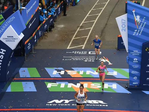 Runners finish the NYC Marathon.