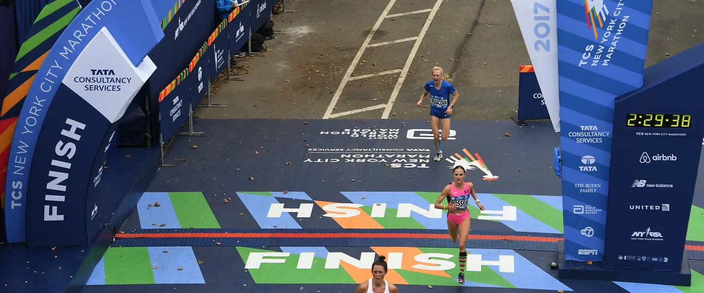 Runners finish the NYC Marathon.
