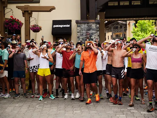 Runners drink at a Beer Mile 