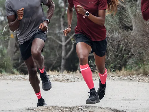 Four runners take off in CEP 4.0 socks of different lengths