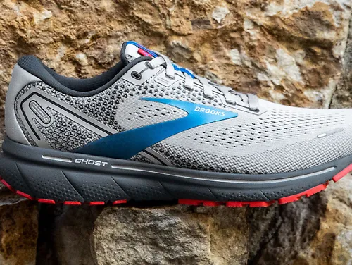 The Brooks Ghost 14 rests on the ground
