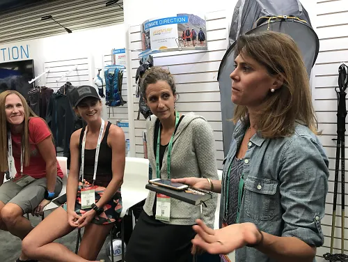 Gina Lucrezi providing guidance to her women's trail running group, Trail Sisters
