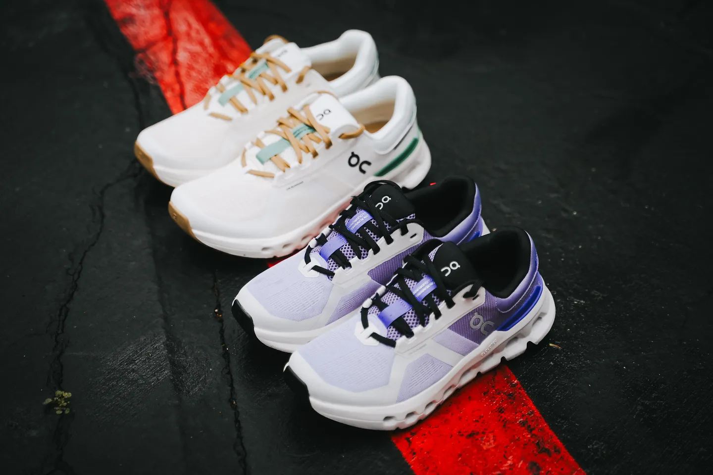 Two pairs of the On Cloudrunner 2 in different colorways sit side by side.