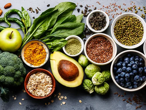 An array of healthy foods, including fruits, nuts, vegetables and whole grains