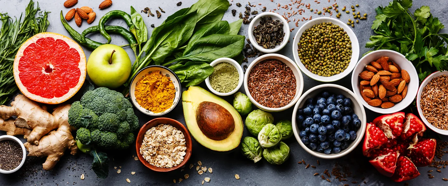 An array of healthy foods, including fruits, nuts, vegetables and whole grains
