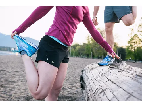 Runners stretching their legs before a race