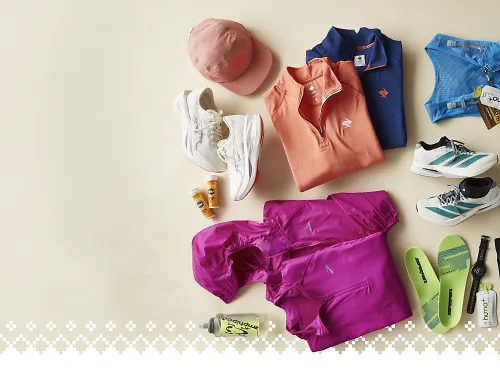 Overhead view of apparel, accessories and shoes in studio