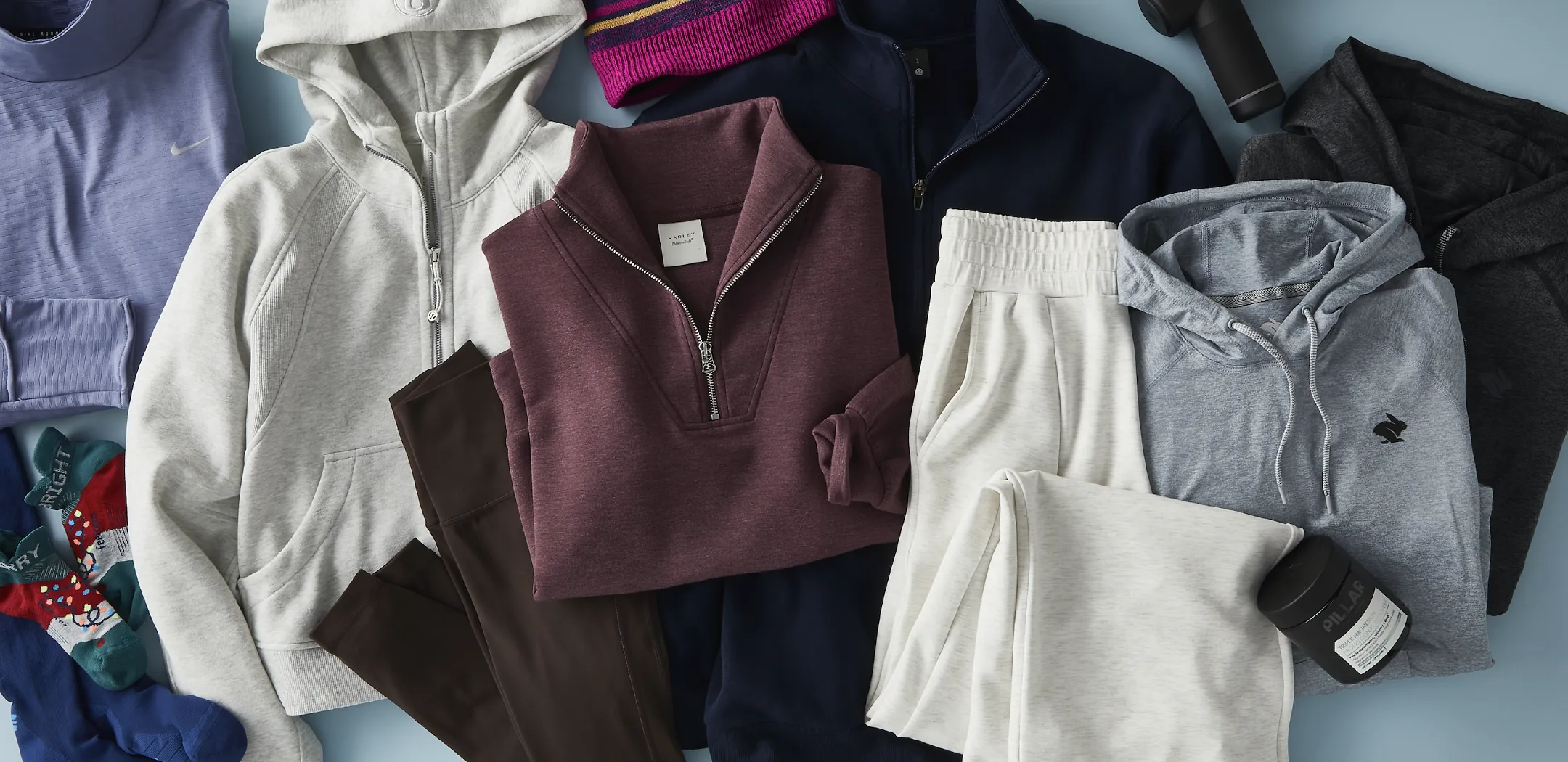 Overhead view of workout apparel and gear as a flat lay