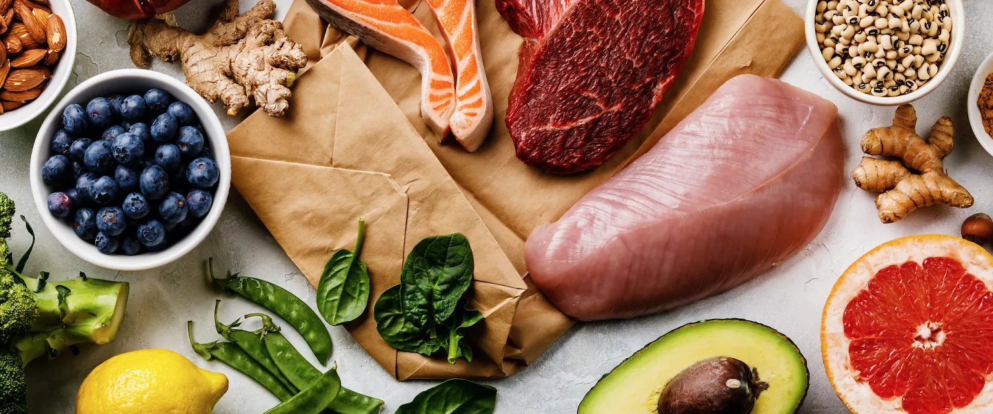 An array of healthy foods, including fish, lean meat, fruits and vegetables