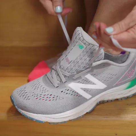 A runner demonstrates the high instep lacing technique