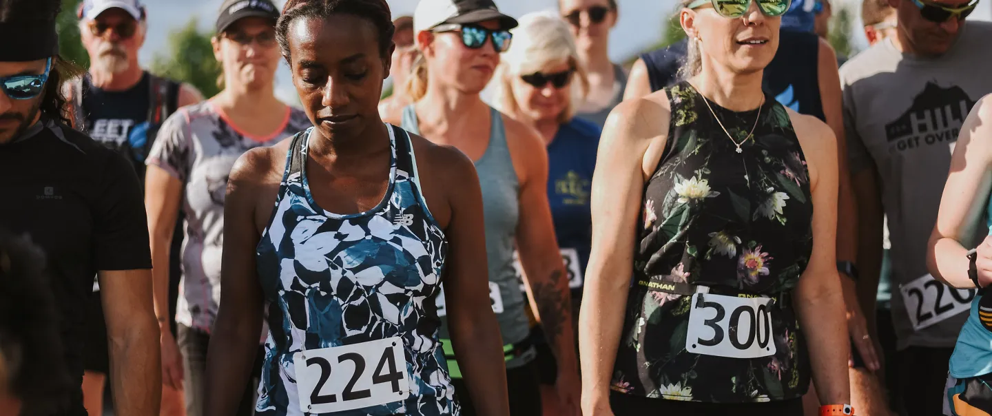 Runners line up at the start of a race