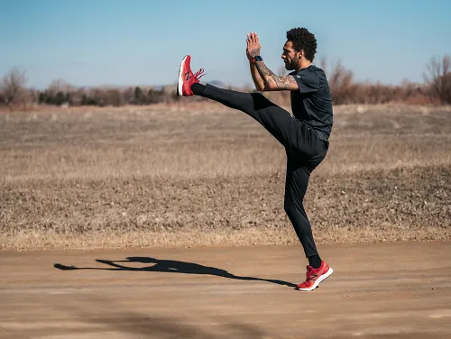 Professional runner Boris Berian does plyometric exercises for runners