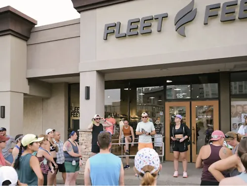 Runners gather for a Nike event at Fleet Feet Nashville. 