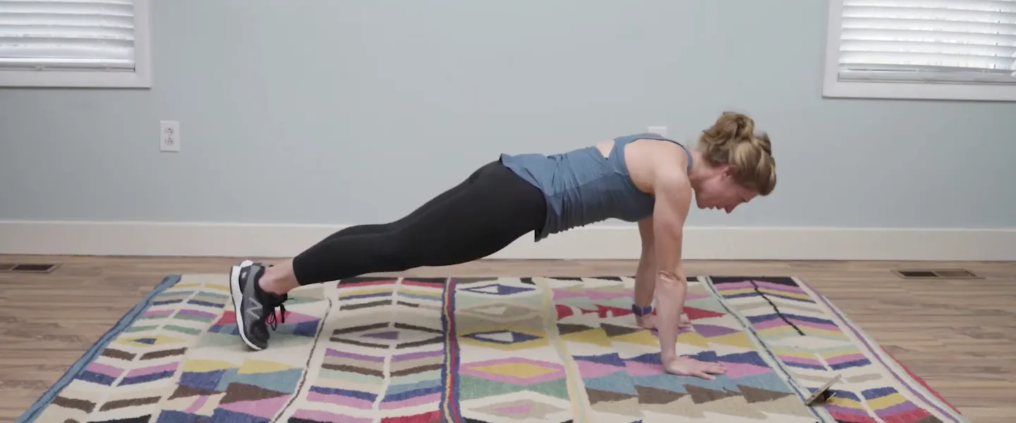 A runner demonstrates how to do a push-up