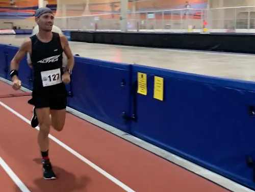 Professional Altra runner Zach Bitter breaks the 100-mile record on a track